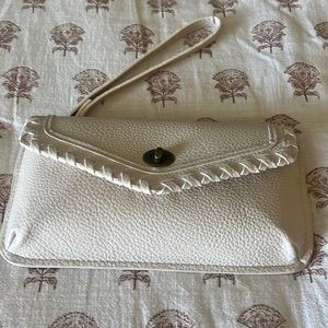 Off white wristlet. Brand new.